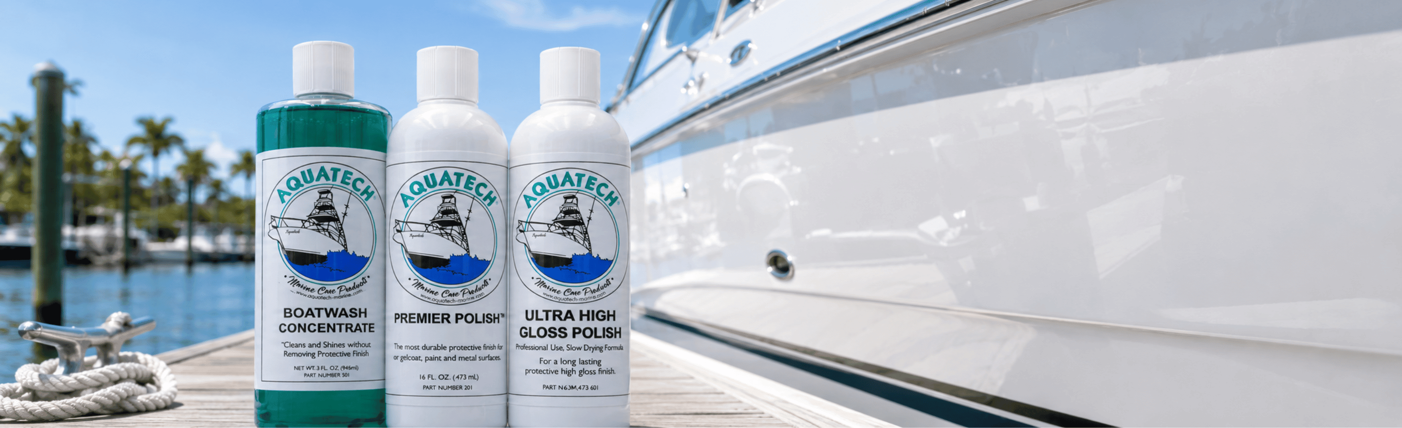 A clean, freshly-waxed boat hull with the Spring Wash & Shine Bundle in the foreground