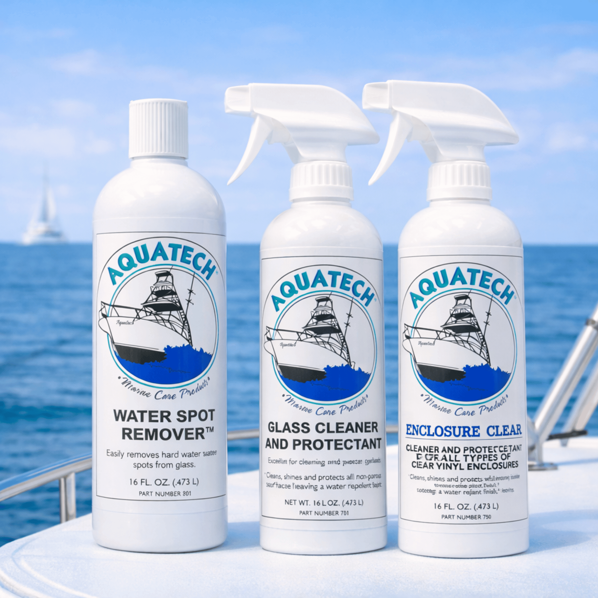 Three Aquatech marine care products on a boat with a blue sky and ocean background.